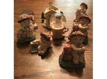 (027) 8 Piece Collection Of Dreamsicle Figurines And Snow Globe
