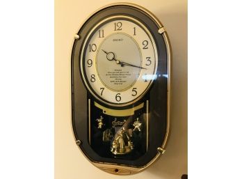 (041) Seiko Oval Wall Clock With Rotating Clown Feature