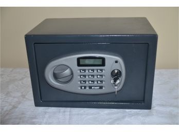 (#121) Small Safe: Battery Operated Combination With Key NEW - Can Be Mounted Wall Or Floor