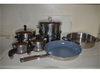 (#128) Assorted Pots And Pans, Strainer Cutting Board