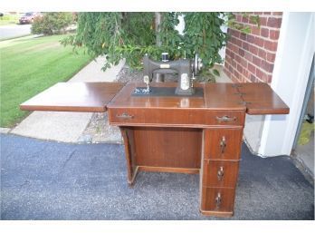 (324) Vintage White Rotary Sewing Machine In MCM Cabinet With 3 Side Drawers With Sewing Notions