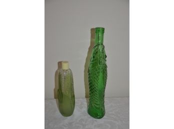 (#44) Vintage Green Glass Fish Design Bottle And Corn On The Cobb Design Glass Bottle With Plastic Cap