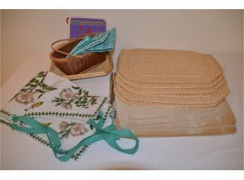 (#30) Wicker Placemats 5 And 4 Silver Placemats And Basket With Vinyl Apron