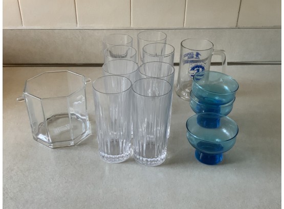 (4) Tall Water Glasses (3) Blue Glass Desert Glasses (1) Postal Mug (1) Ice Bucket