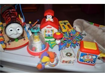 (#10) Box Full Of Children And Baby Toys Fisher Price, Thomas The Train Bead Maze Puzzle, Disney Pop Up