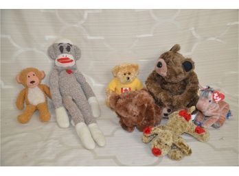 (#134) Lot Of Assorted Stuffed Animals: Sock Monkey, Brown Bear, Monkey, Dog, Horse, Ty Beanie Baby