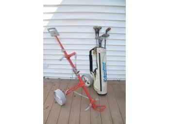 (#218) Golf Clubs And Bag Caddy On Wheels