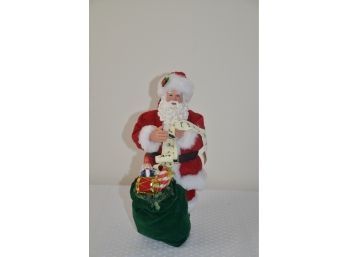 (#53) Christmas Santa Claus Figurine Holding Bag Of Toys And List