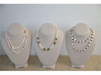 (#56) Lot Of 3 Necklaces 1- Black / Pearl 16' 2- Shells 18' 3- Pink / Green Pearl 8'