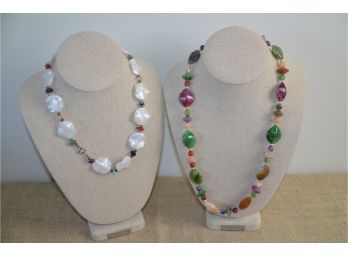 (#54) Lot Of 2 Necklaces 1- Plastic White Pearl 9' 2- Multi Color Stone 12'