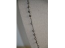 (#104) Long Bead Chain Center Leaf Bottom Tassel 21'