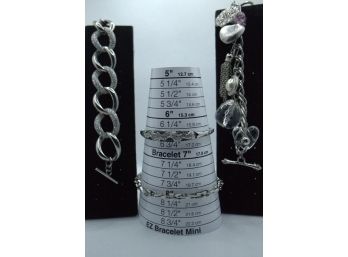 4- Silver Bracelets/ 2-  Toggle Bracelets  1-S Steel Link / 1- Silver Bangle