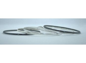 5- Stackable Bracelets - 2 Silver Color/ 2 Black  8 1/2”