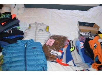 Assortment Of Boys Clothing And Patagonia Jacket