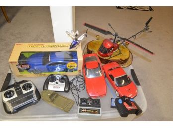 (#233 )Remote Control Cars And Helicopter