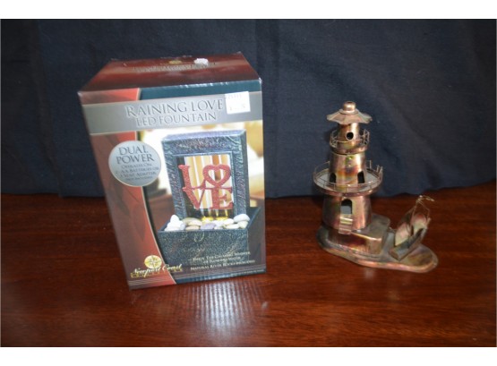 (#83) NEW Raining Love Fountain And Musical Lighthouse (not Tested)