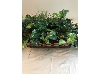 (45)  Wicker Planter With Artificial Greens