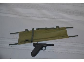 (#81) Army Cot And Plastic Toy Gun
