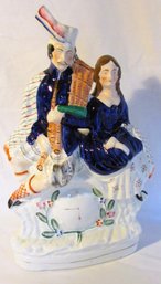 A 19th Century Staffordshire Porcelain 'Clock' Figurine Of Bonnie Prince Charles And Flora