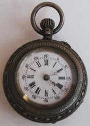 A Small Unmarked Swiss Pocket Watch In An Elaborate 800 Silver Case.