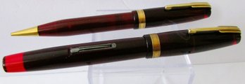 A Waterman's Ideal Maroon Pen And Pencil Set