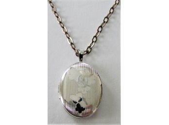 A Silver Locket On A Sterling Chain.