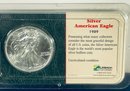 1989 SILVER AMERICAN EAGLE  - 1 0ZT. .999 FINE SILVER COIN IN LITTLETON COIN DISPLAY CASE