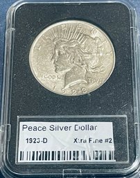 1923-D PEACE SILVER DOLLAR COIN - XF - IN PLASTIC CASE
