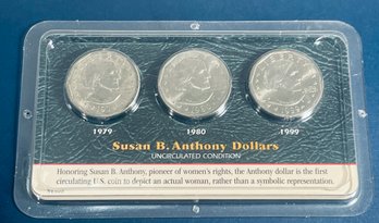 SET OF (3) SUSAN B ANTHONY DOLLARS - UNCIRCULATED CONDITION IN LITTLETON COIN DISPLAY CASE