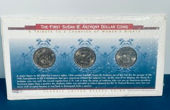 COMMEMORATIVE - THE FIRST SUSAN B. ANTHONY DOLLAR COINS - 3 COIN SET - IN SEALED PLASTIC
