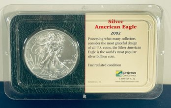 2002 SILVER AMERICAN EAGLE  - 1 0ZT. .999 FINE SILVER COIN IN LITTLETON COIN DISPLAY CASE