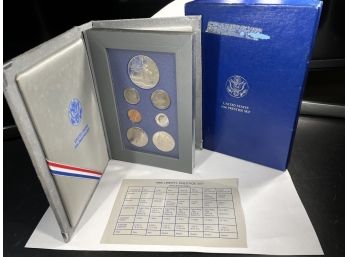 1986 UNITED STATES PRESTIGE COIN SET- SOME DAMAGE TO BOX