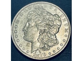 1879 MORGAN SILVER DOLLAR COIN - DRILLED AND FILLED - SEE PICTURES