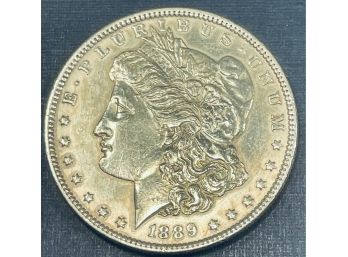 1889 MORGAN SILVER DOLLAR COIN - AU