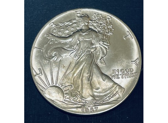 1987 UNITED STATES SILVER AMERICAN EAGLE SILVER COIN  - ONE OZ. .999 FINE SILVER ROUND