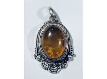 VINTAGE STERLING SILVER AMBER CABOCHON PENDANT - 1.25' X 1'