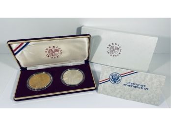 1988 TWO-PIECE PROOF COMMEMORATIVE COIN DOLLAR SET - 'AMERICA IN SPACE' - INC .900 SILVER & BRONZE DOLLARS