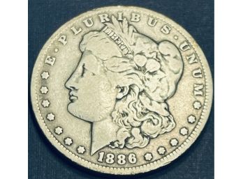 1886-O MORGAN SILVER DOLLAR COIN