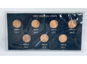 1982 LINCOLN MEMORIAL CENTS COLLECTION OF 7 COINS IN DISPLAY AND PLASTIC