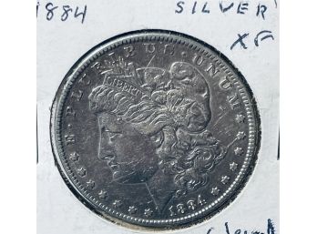 1884 MORGAN SILVER DOLLAR COIN - XF- CLEANED
