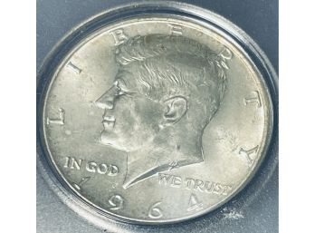 1964 KENNEDY SILVER HALF DOLLAR COIN - IN PLASTIC CASE