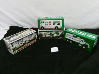 Nice Lot Of 4 HESS Trucks New In Original Boxes.