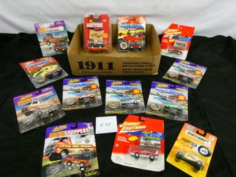 Nice Lot Of 13 Johnny Lightning And Matchbox Die Cast Cars. New In Package