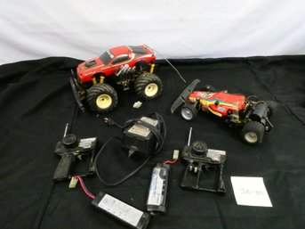 2 RC Cars W/ Batteries And Controllers. Untested.