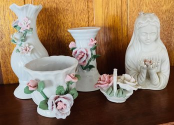 Pretty And Delicate Flowers On These Vases And Holders