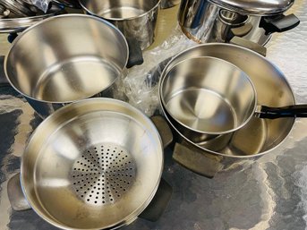 Stainless Pots And Pans With Lids.  Includes Double Boiler Too.  All Great Condition!