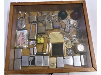 Wood & Glass Showcase Lot Of Locks & Keys, Butane Lighters, Compass, Compact Mirror & Misc. Items