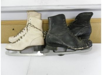 Two Pairs Of Old Ice Skates