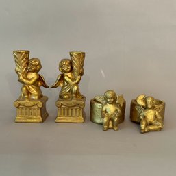 Two Pairs Of Gold Painted Ceramic Cherub Candle Holders