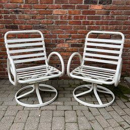 Pair Of Outdoor Swivel-Rocker Arm Chairs